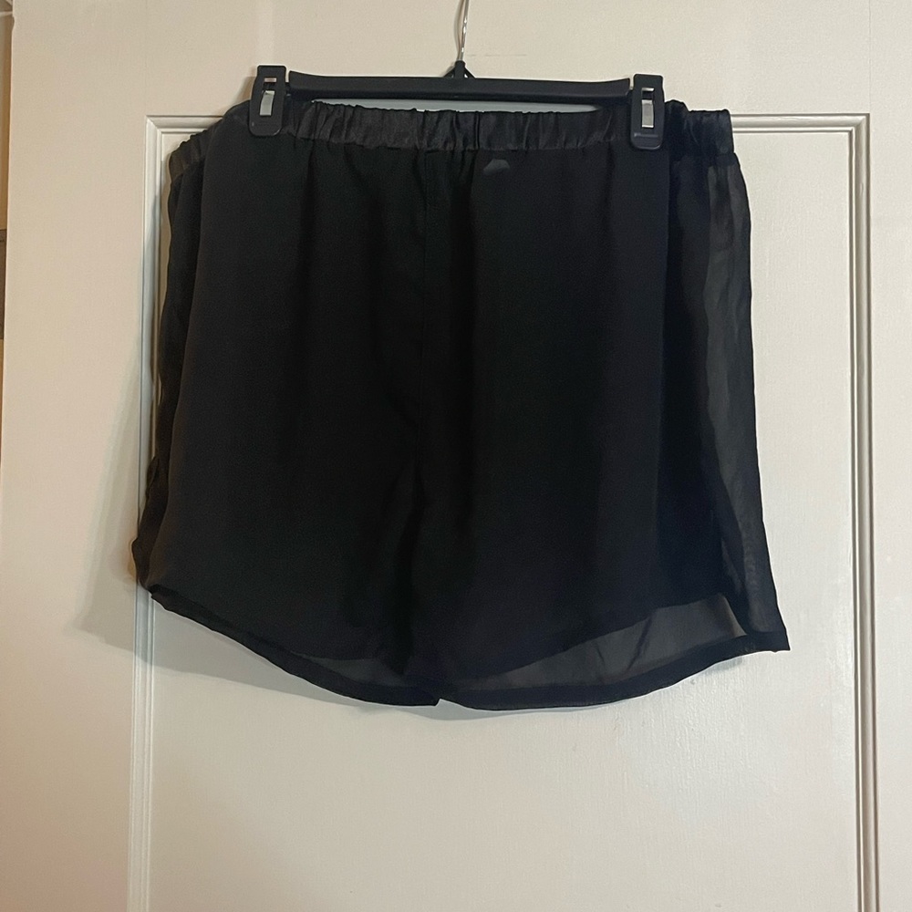 NDS black sheer short. Good condition